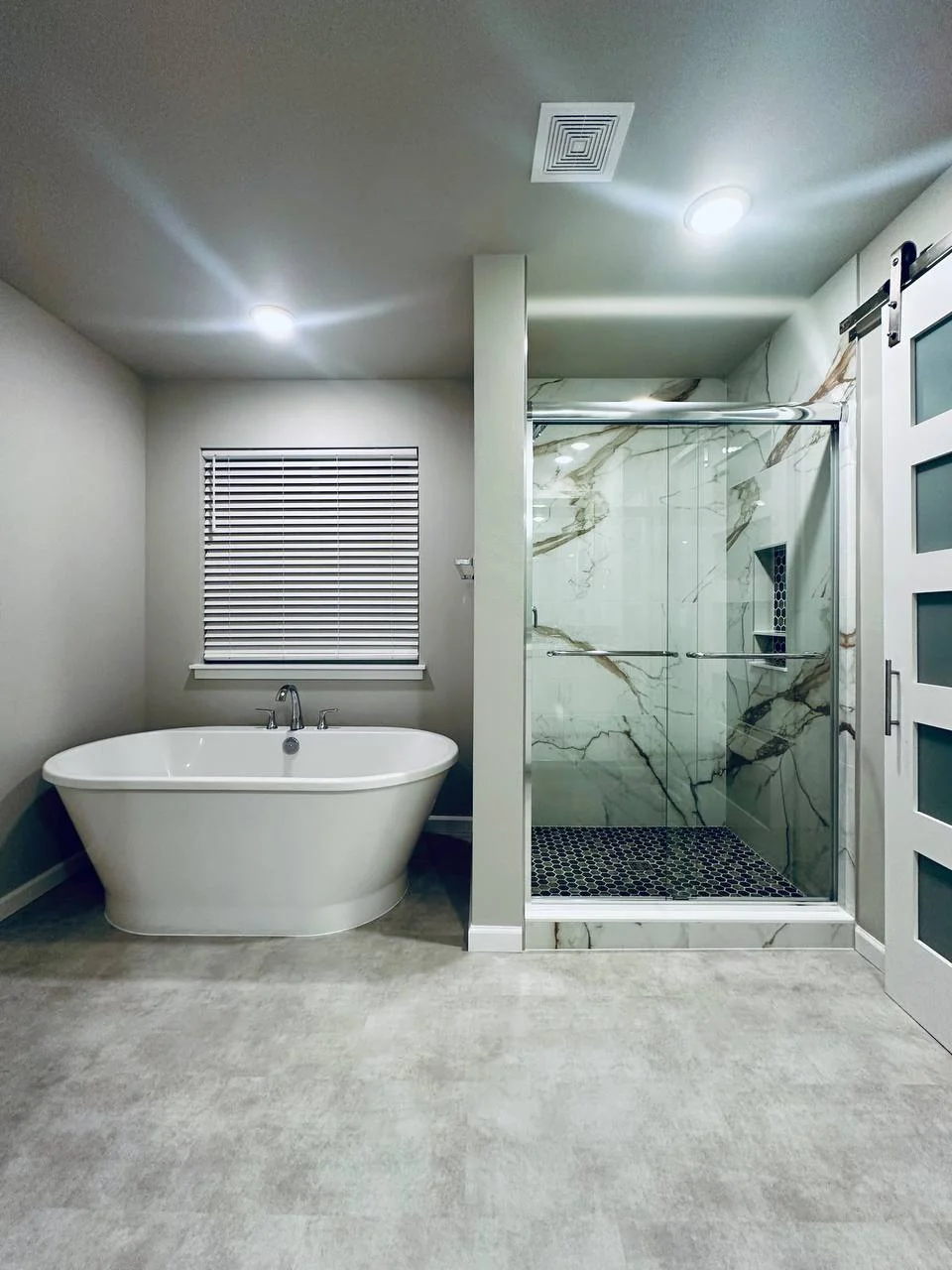 Modern double vanity with storage drawers and quartz countertop Seattle bathroom remodel.